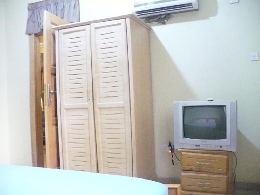 True Vine Hotel Kumasi Rum bild